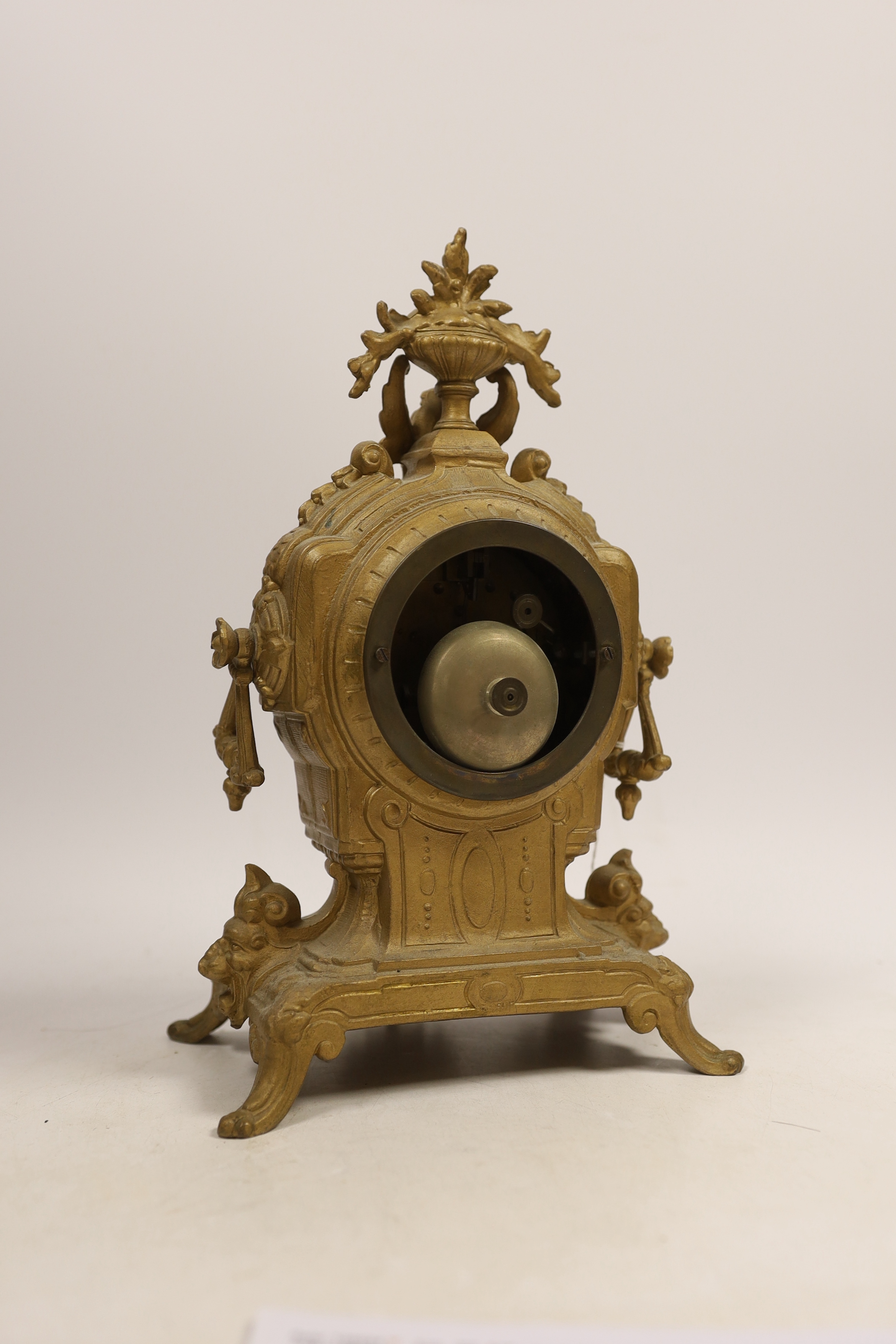 A French spelter mantel clock, 30cm high